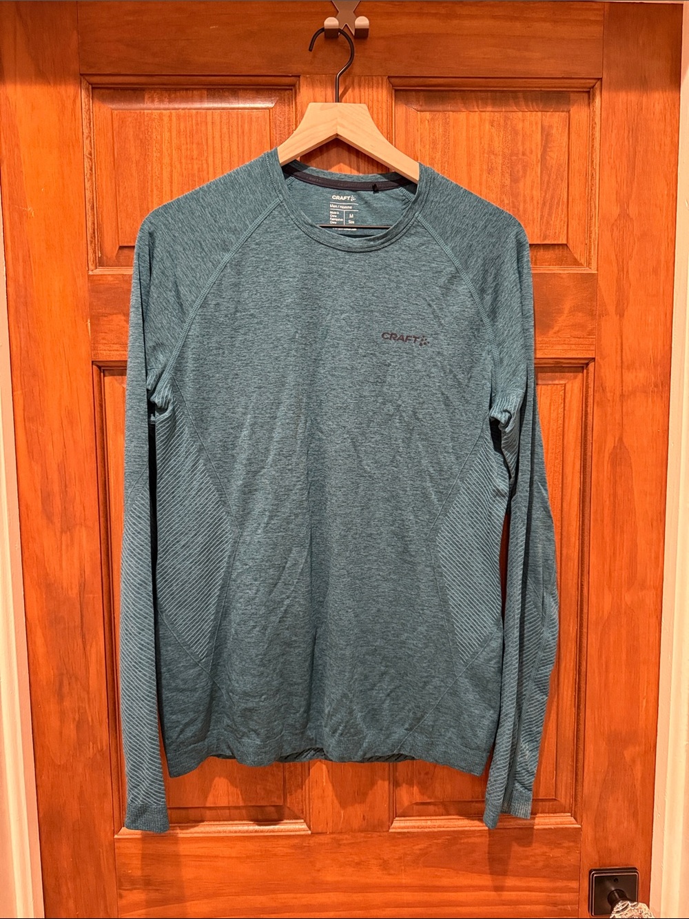 Craft Men's Long-Sleeve Performance Top in Teal Blue